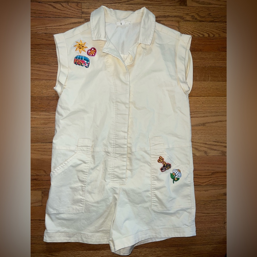 Charming Cream Romper with Playful Patches